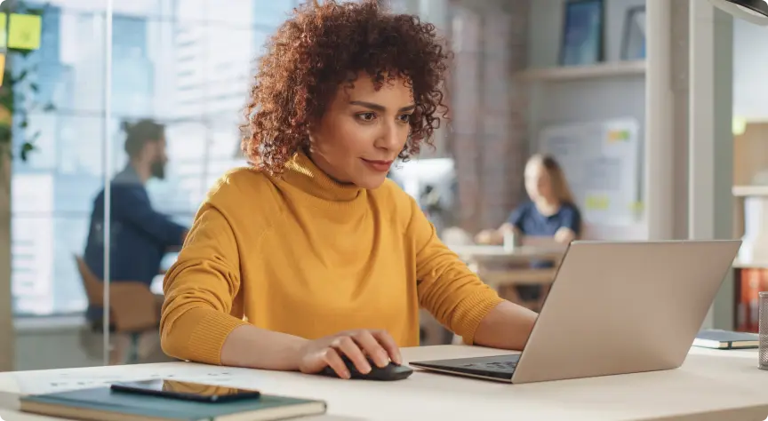 Woman staring at the laptop screen